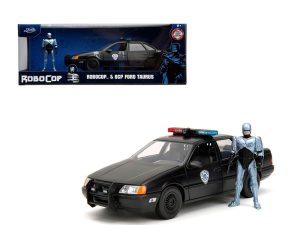 AUTO FORD TAURUS 1987 OCP CON ROBOCOP 1:24